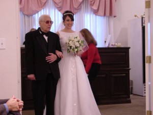 My father walking me down the aisle, his hair growing back after the latest round of chemo.  Thank you for living to see my wedding, daddy, it meant the world to me.