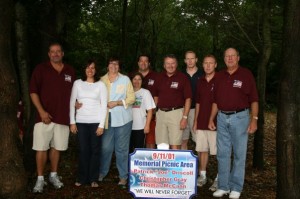 Chris Driscoll, 5th person from the left, his wife Erica Driscoll, 4th person from the left.